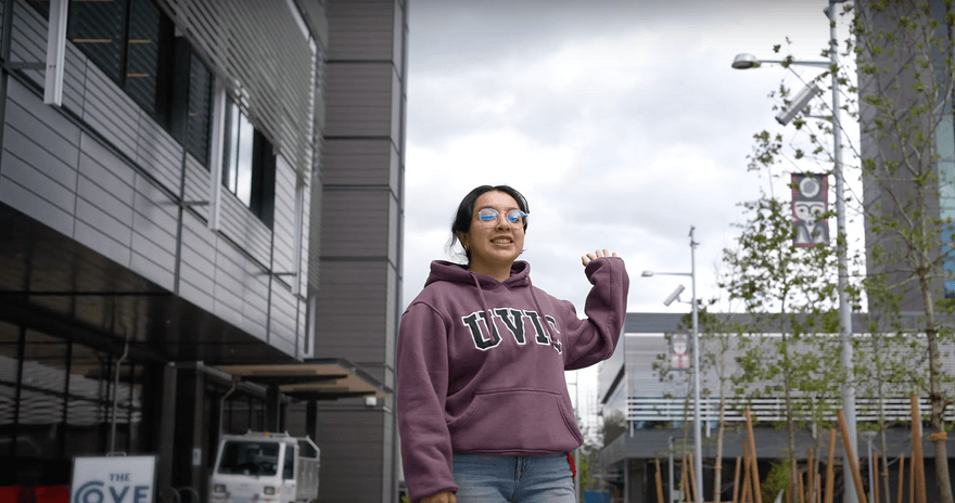 A student guiding the campus tour