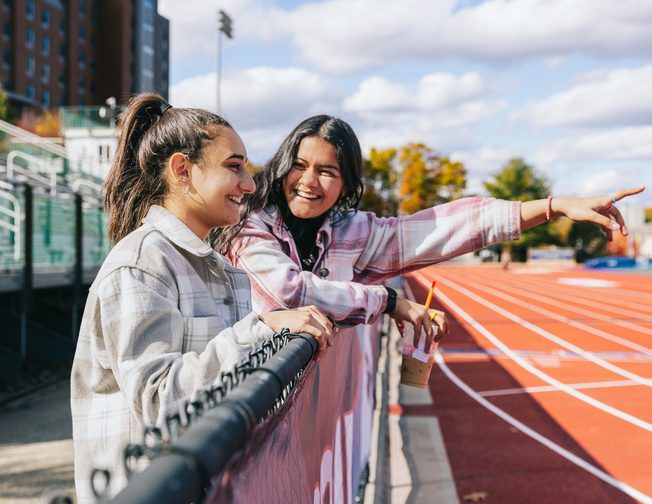 Two students at the UConn Track and Field complex