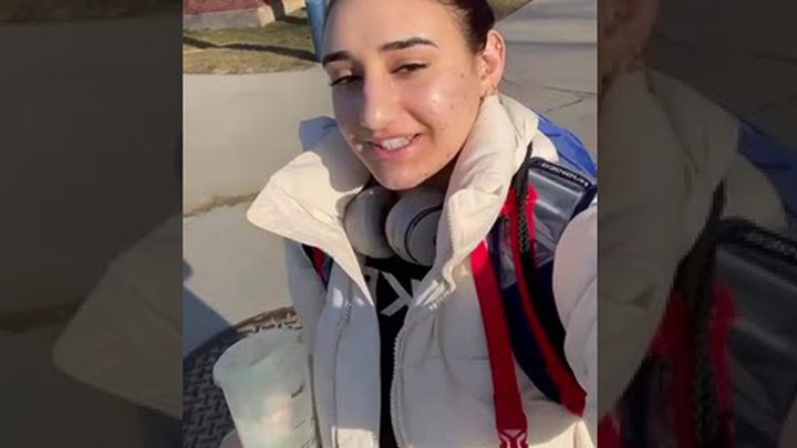 A student showing around UConn campus