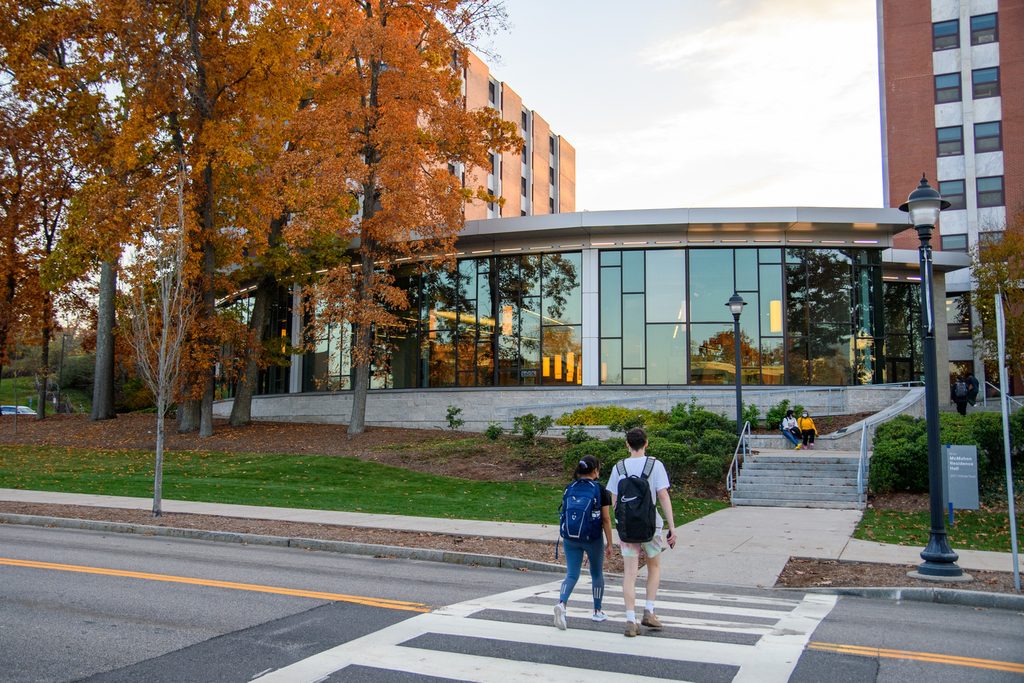 Students walking to the McMahon Dining Hall at the UConn Storrs campus