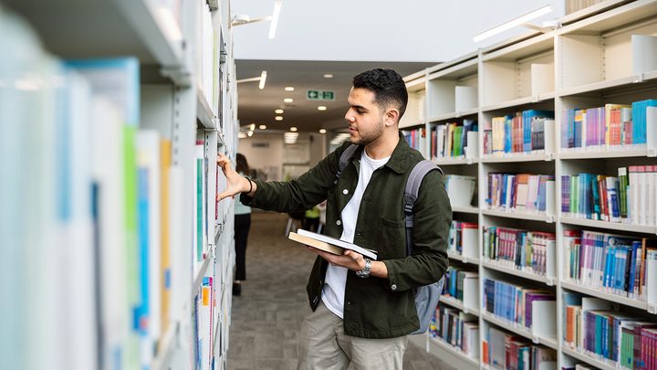 Bournemouth University student in the library