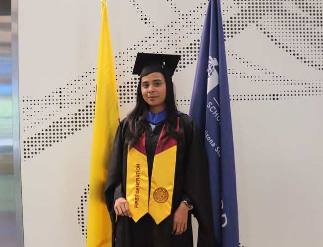 Nina smiling during graduation