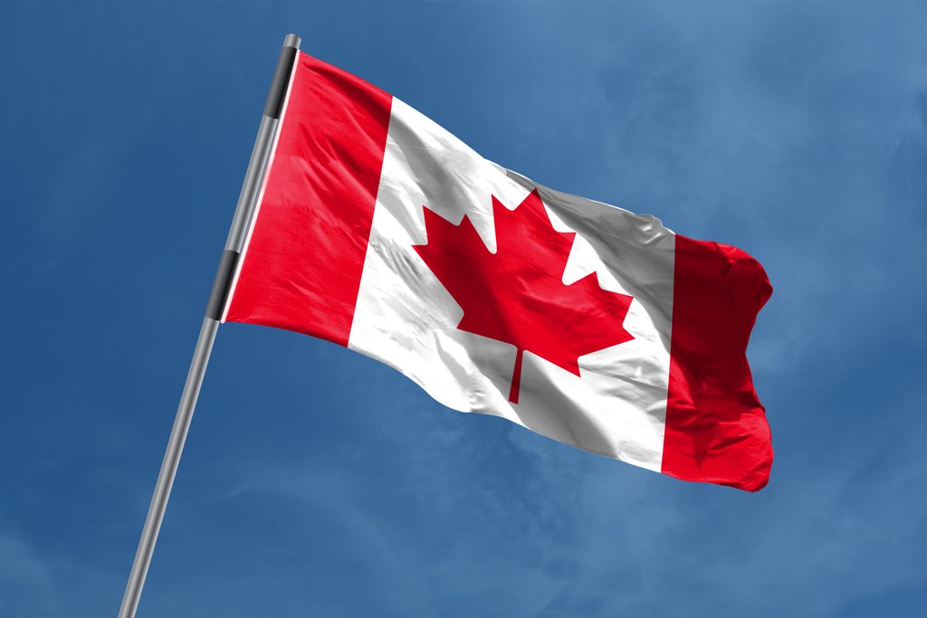 Canadian flag waving in the wind