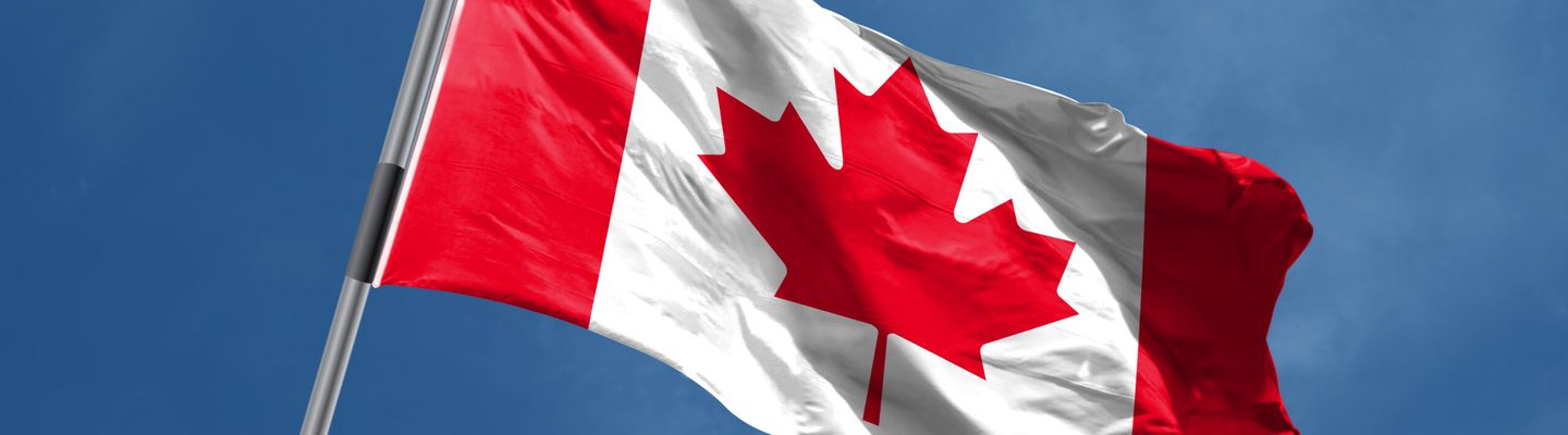 Canadian flag waving in the wind