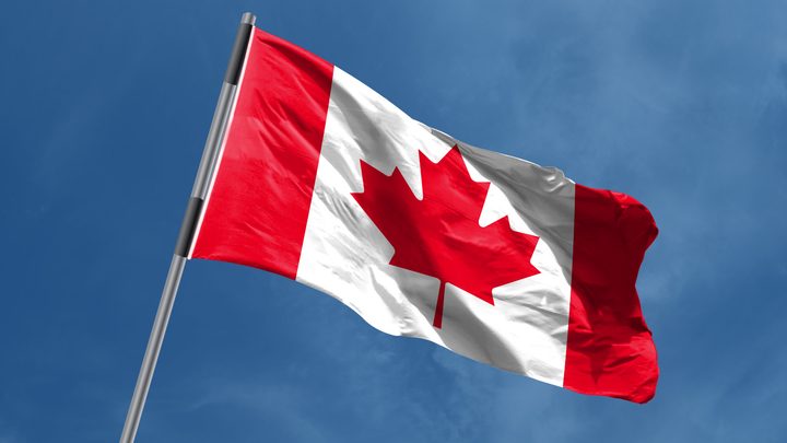 Canadian flag waving in the wind