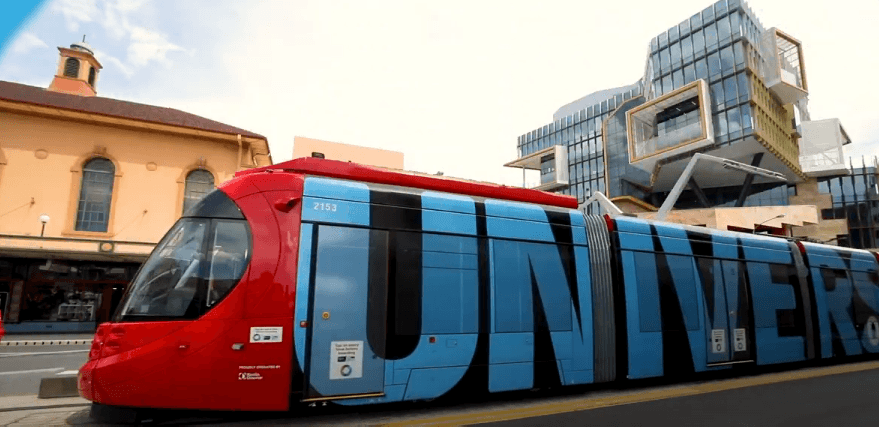 A train with University of Newcastle logo on it