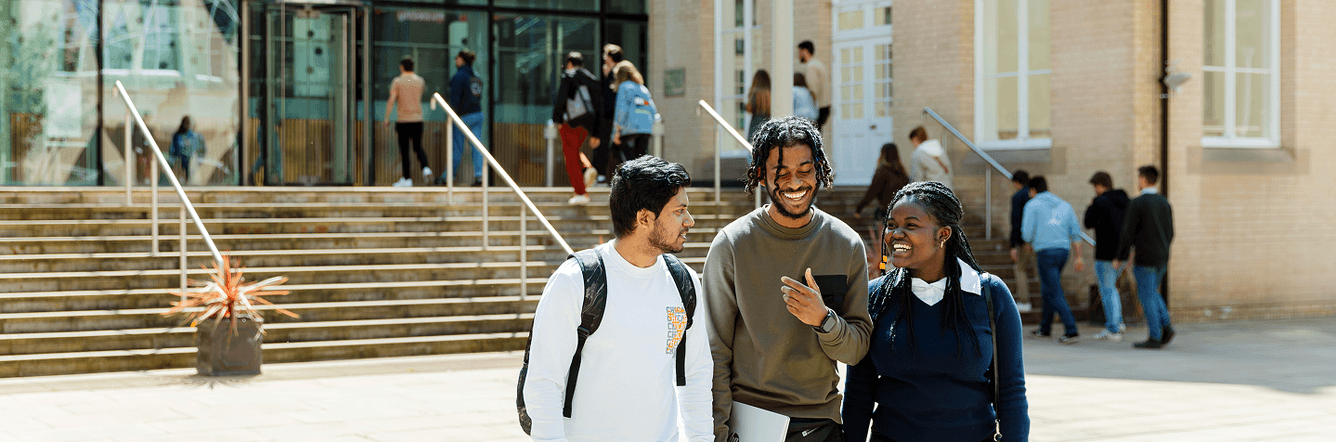 Group of students walking near campus
