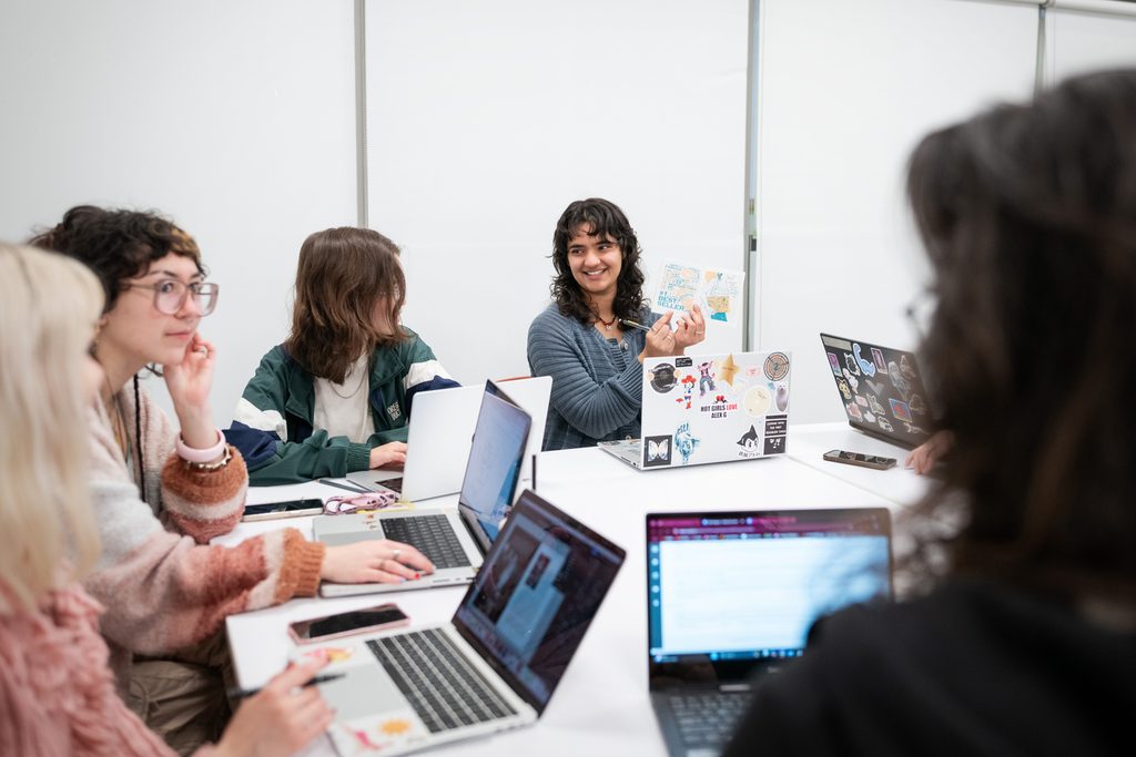 Students participating in a classroom discussion at Emily Carr University
