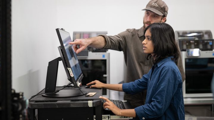 Student working with digital technology in a learning space at Emily Carr University.