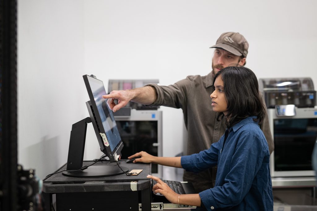 Student working with digital technology in a learning space at Emily Carr University.