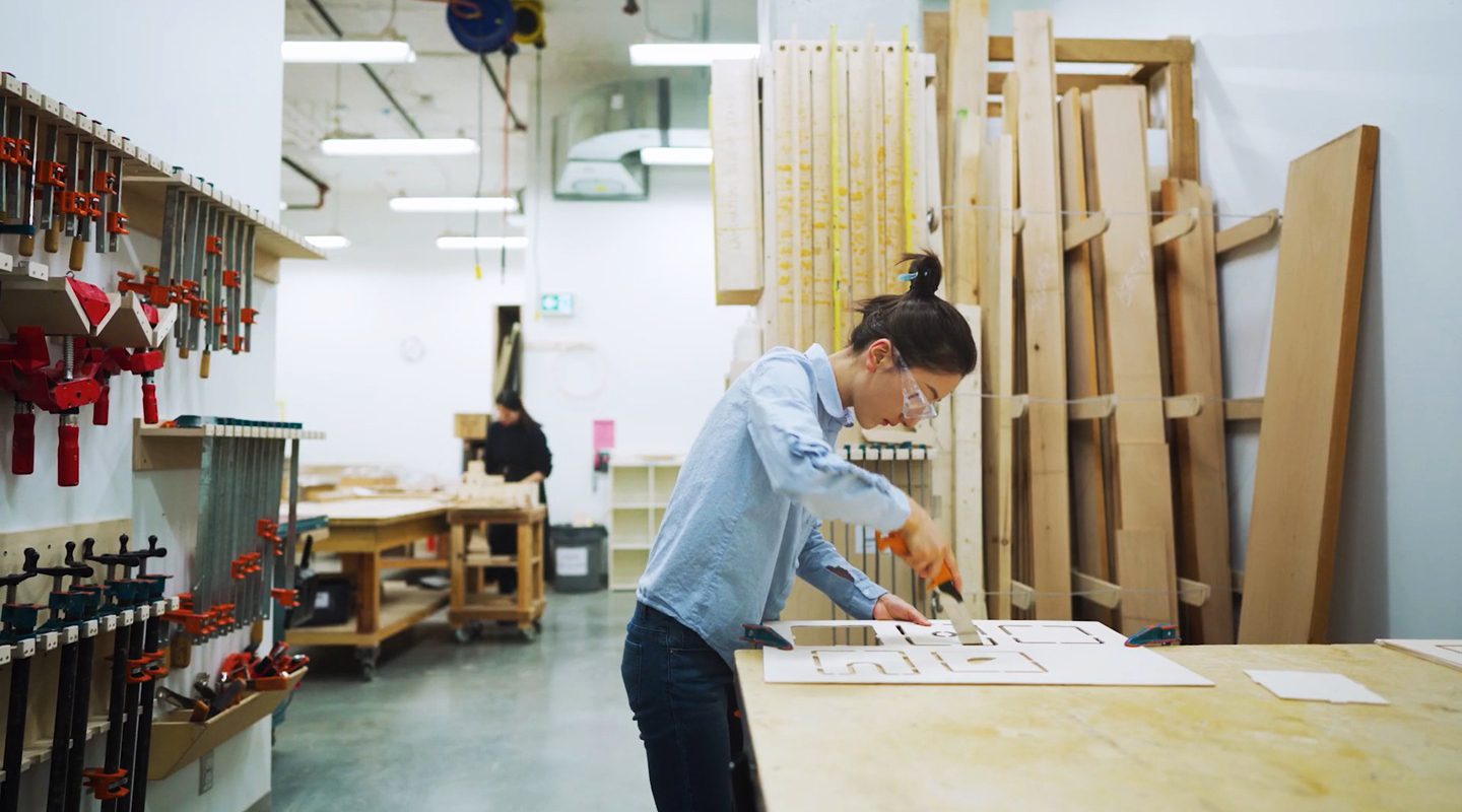 Student working on a hands-on design project in a workshop at Emily Carr University